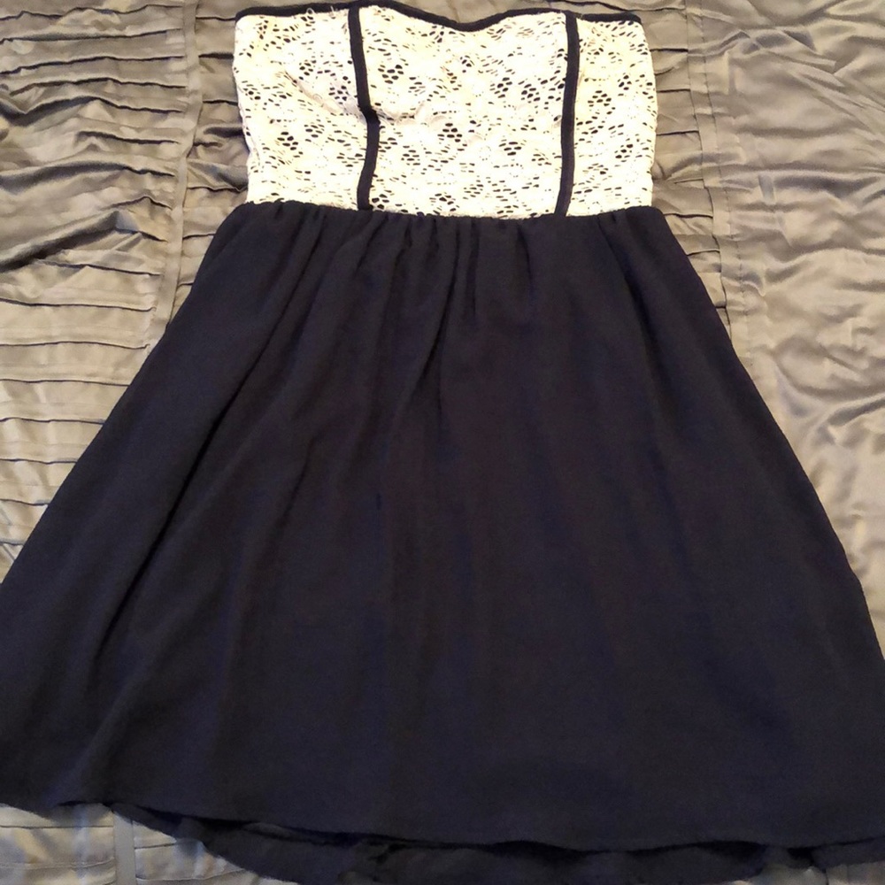 Navy mini strapless mini dress with cream eyelet
